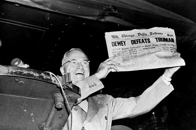 President-elect Harry S. Truman laughs heartily as he holds an early edition of the Chicago Tribune for November 4, 1948, with the headline “Dewey Defeats Truman.” The newspaper, whose headline jumped to an erroneous conclusion as early election returns came in, was shown to Truman as he stopped in St. Louis, Mo., during his victorious return trip to Washington. File Photo by Frank Cancellare/UPI