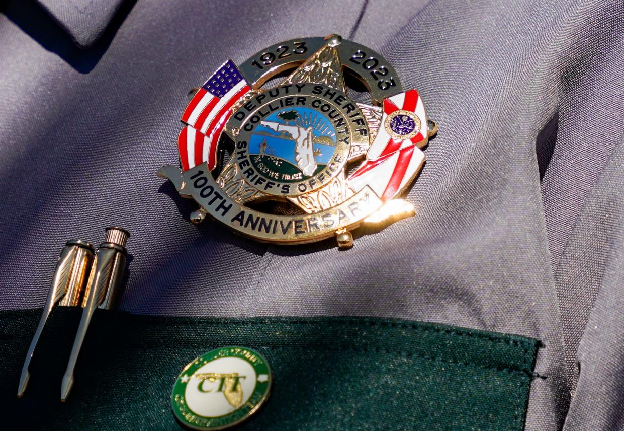 The centennial badge is worn by Sheriff Kevin Rambosk at Everglades City Hall in Everglades City on Monday, Jan. 9, 2023.