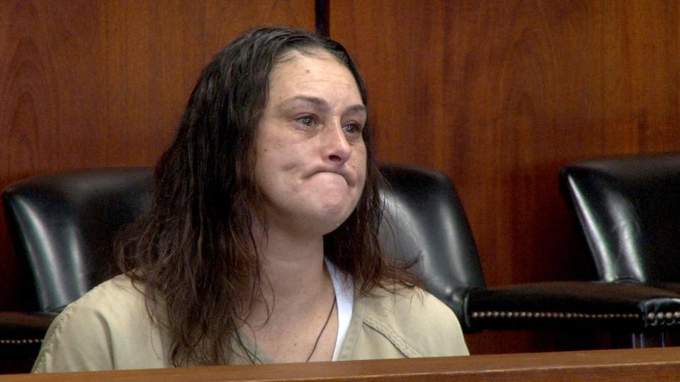 Helecia Morris reacts as she was sentenced for child endangerment before Superior Court Judge Lisa A. Puglisi in Toms River Friday, July 7, 2023.  She and her wife Donna Jung were both sentenced for locking their then 8--year-old son in a dark room without furniture for months, without allowing him to use the bathroom.