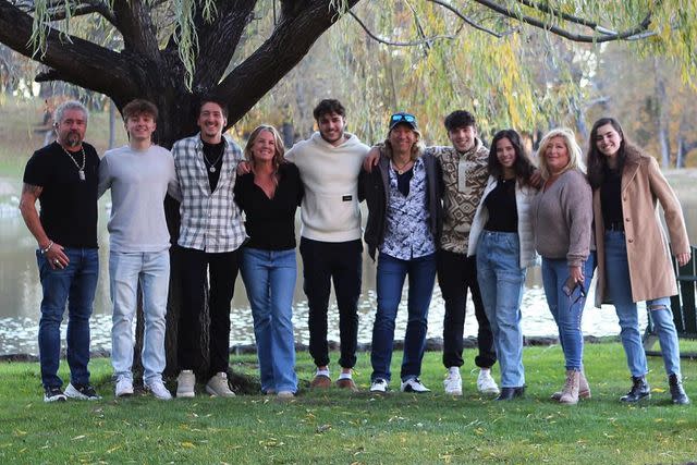 <p>Dustin Rota</p> Guy Fieri with his family on the day his son Hunter proposed.