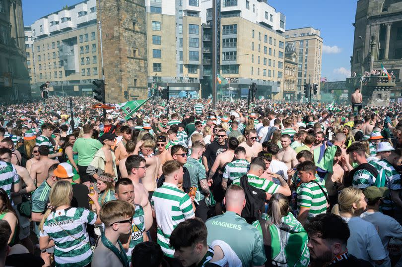 Police closed down roads in Glasgow's Trongate after Celtic fans took the area over.