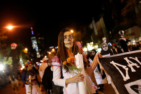 People participate in the New York City Halloween parade in New York City, NY, U.S., October 31, 2017. REUTERS/Shannon Stapleton