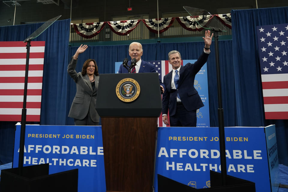 President Joe Biden smiles to the crowd after delivering remarks during a campaign event with Vice President Kamala Harris in Raleigh, N.C., Tuesday, March 26, 2024, as Vice President Kamala Harris and Gov. Roy Cooper, D-N.C., look on. (AP Photo/Stephanie Scarbrough)