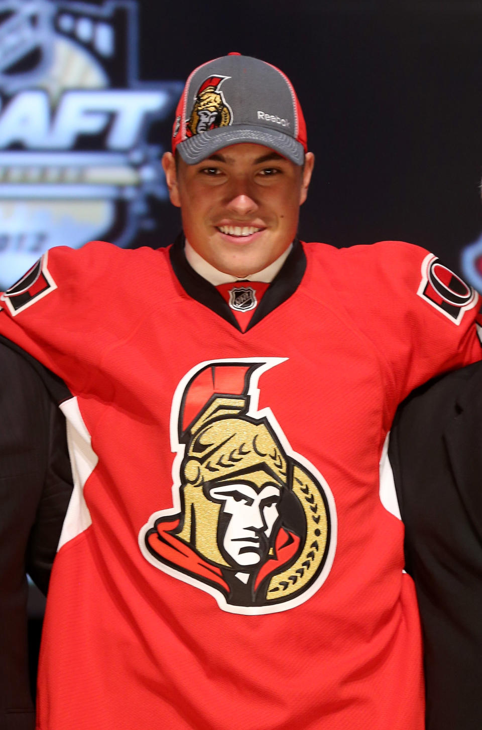 PITTSBURGH, PA - JUNE 22: Cody Ceci, 15th overall pick by the Ottawa Senators, poses on stage during Round One of the 2012 NHL Entry Draft at Consol Energy Center on June 22, 2012 in Pittsburgh, Pennsylvania. (Photo by Bruce Bennett/Getty Images)