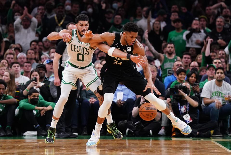 Jayson Tatum, left, and the Boston Celtics host Giannis Antetokounmpo, right, and the Milwaukee Bucks on Christmas Day.