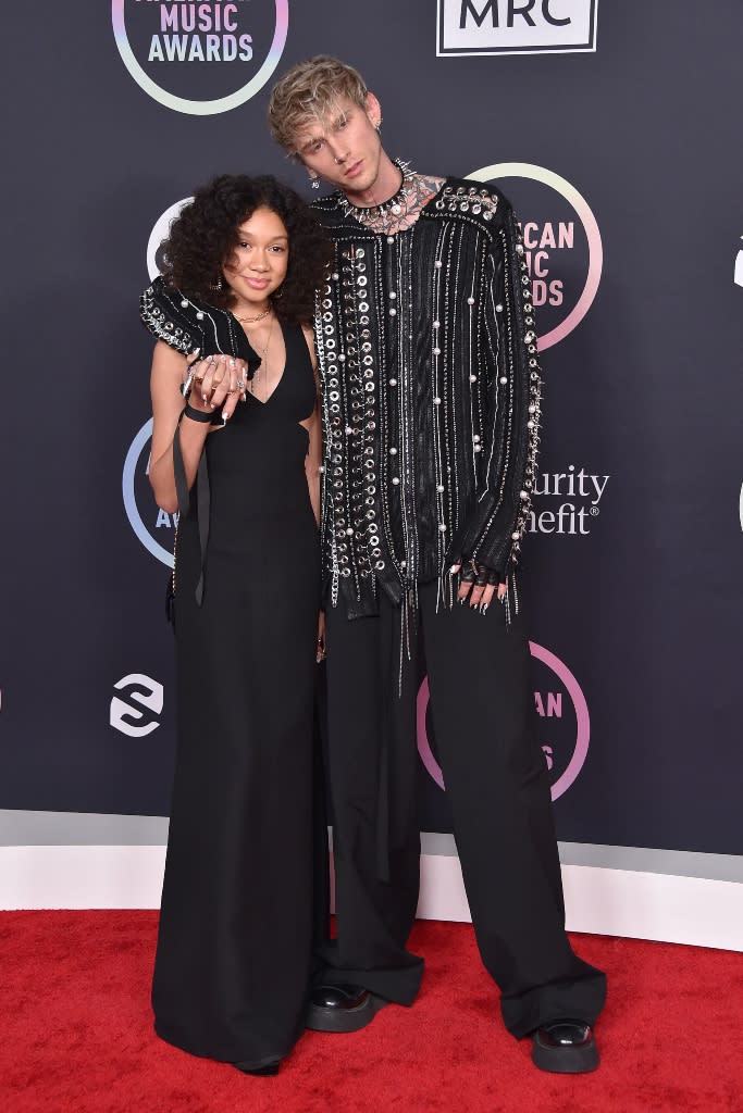 Machine Gun Kelly and Casie Baker arrive at the 2021 American Music Awards at the Microsoft Theater in Los Angeles, California. - Credit: OConnor / AFF-USA.com / MEGA