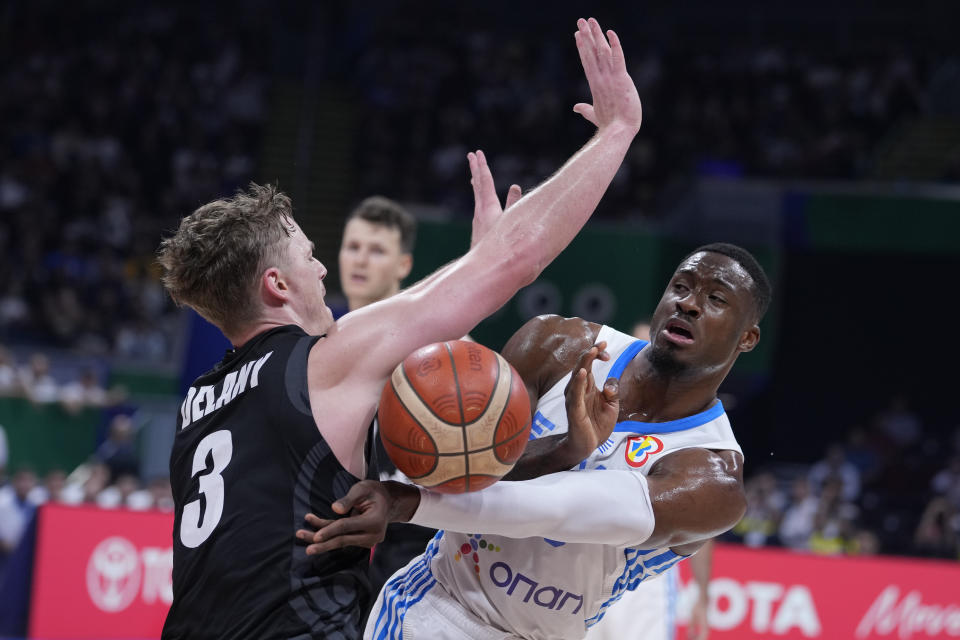 New Zealand forward Finn Delany (3) blocks a pass from Greece forward Thanasis Antetokounmpo (43) during the second half of a Basketball World Cup group C match in Manila, Philippines Wednesday, Aug. 30, 2023. (AP Photo/Michael Conroy)