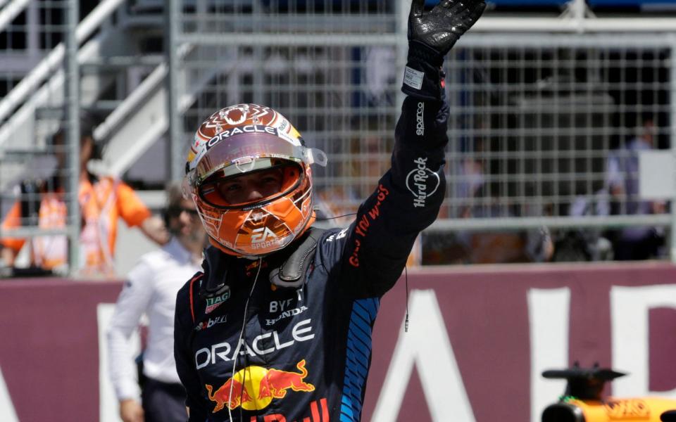 Max Verstappen waves to the crowd after winning the sprint