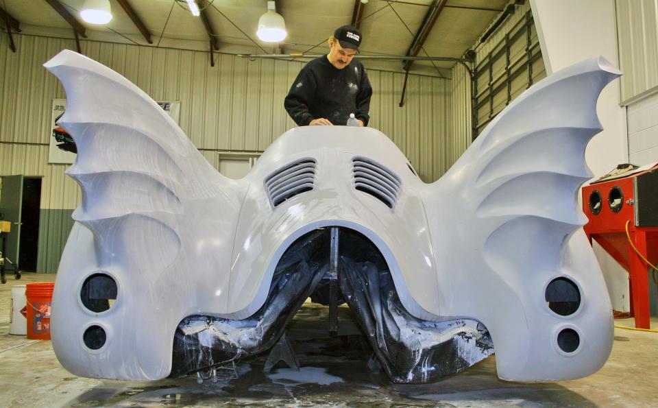 Carl Casper works on his Batmobile which is part of the Custom CARisma: The Legendary Creations of Carl Casper