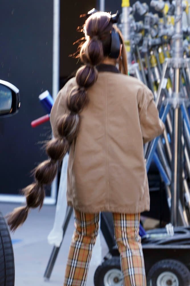 Ariana Grande Shows Off Massive Bubble Ponytail That Goes All the Way Down to Her Legs