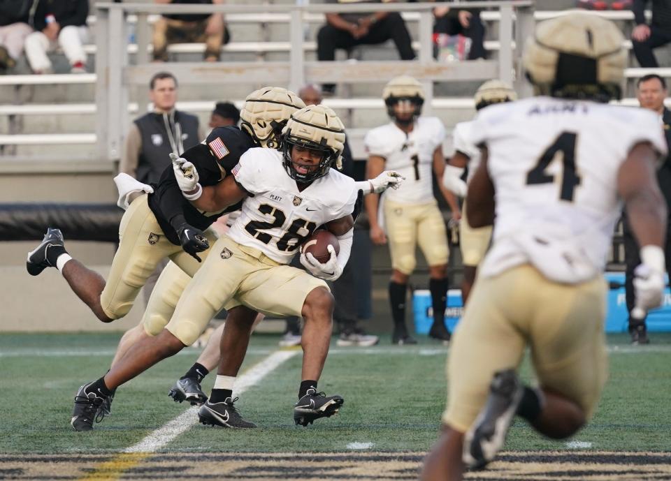 Army West Point defensive back Donavon Platt (28) with an interception during a spring scrimmage at Michie Stadium on the campus of the USMA at West Point in West Point on Friday.