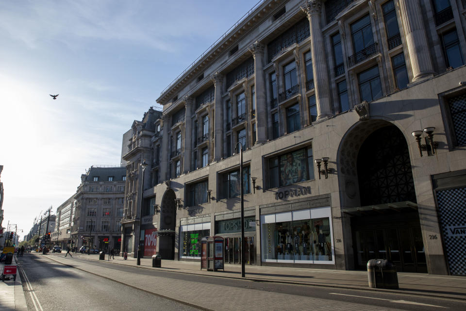 Major shops on Oxford Street, closed for business. March 24th 2020 was the first day of enforced lockdown in the UK, in order to stop the spread of the Coronavirus Covid 19. On what would normally be a bustling business / week day in London, the city was deserted, with just a few people in masks out on the street, plus a few taxis and mostly empty buses. (photo by Phil Clarke Hill/In Pictures via Getty Images)