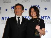 Lacey Turner with the award for Serial Drama Performance and Bradley Walsh, at the National Television Awards 2010, at the 02 Arena, London. (Photo by Zak Hussein/PA Images via Getty Images)