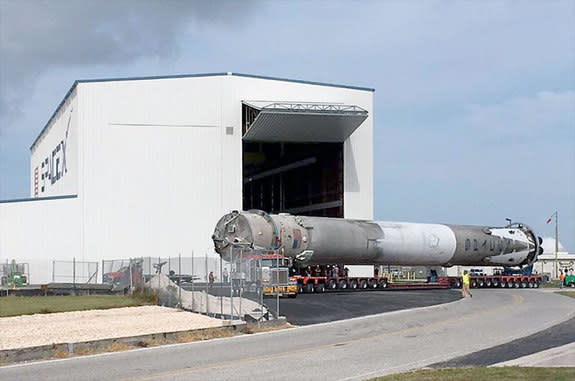 SpaceX’s recovered Falcon 9 first stage rolls up to the horizontal integration facility at the Kennedy Space Center's Launch Complex 39A in Florida on Dec. 24, 2015.