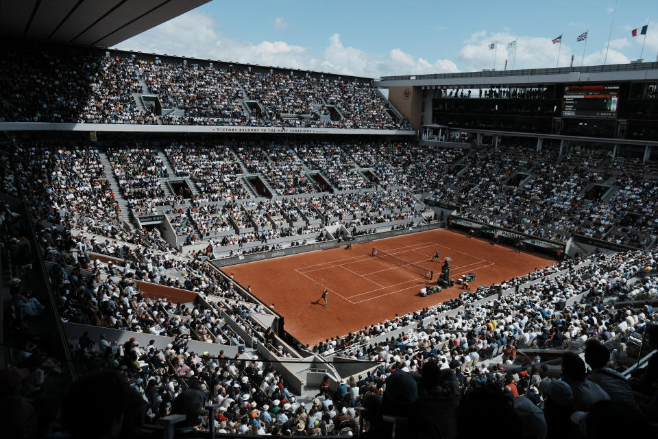 The crowd watch Norway's Casper Ruud playing Spain's Rafael Nadal on the court Philippe Chatrier, known as center court, during their final match of the French Open tennis tournament at the Roland Garros stadium Sunday, June 5, 2022 in Paris. The Roland Garros stadium will host the tennis competitions during the Paris 2024 Olympic Games. (AP Photo/Thibault Camus, File)