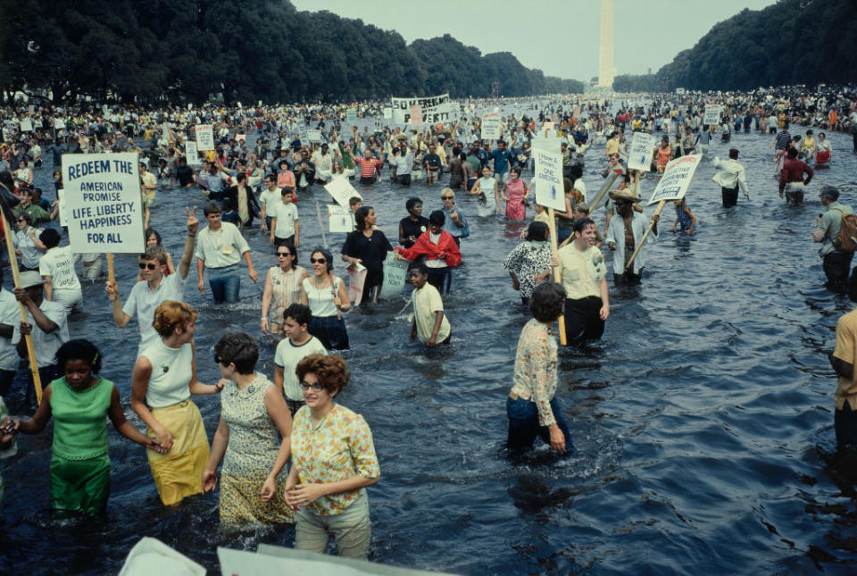 Protestors wading in the Lincoln Memorial reflecting pool in Washington, D.C., during the Poor People's Campaign, or aka the Poor People's March on Washington on June, 19, 1968. | John D. Bunns Jr./Pictorial Parade/Archive Photos—Getty Images