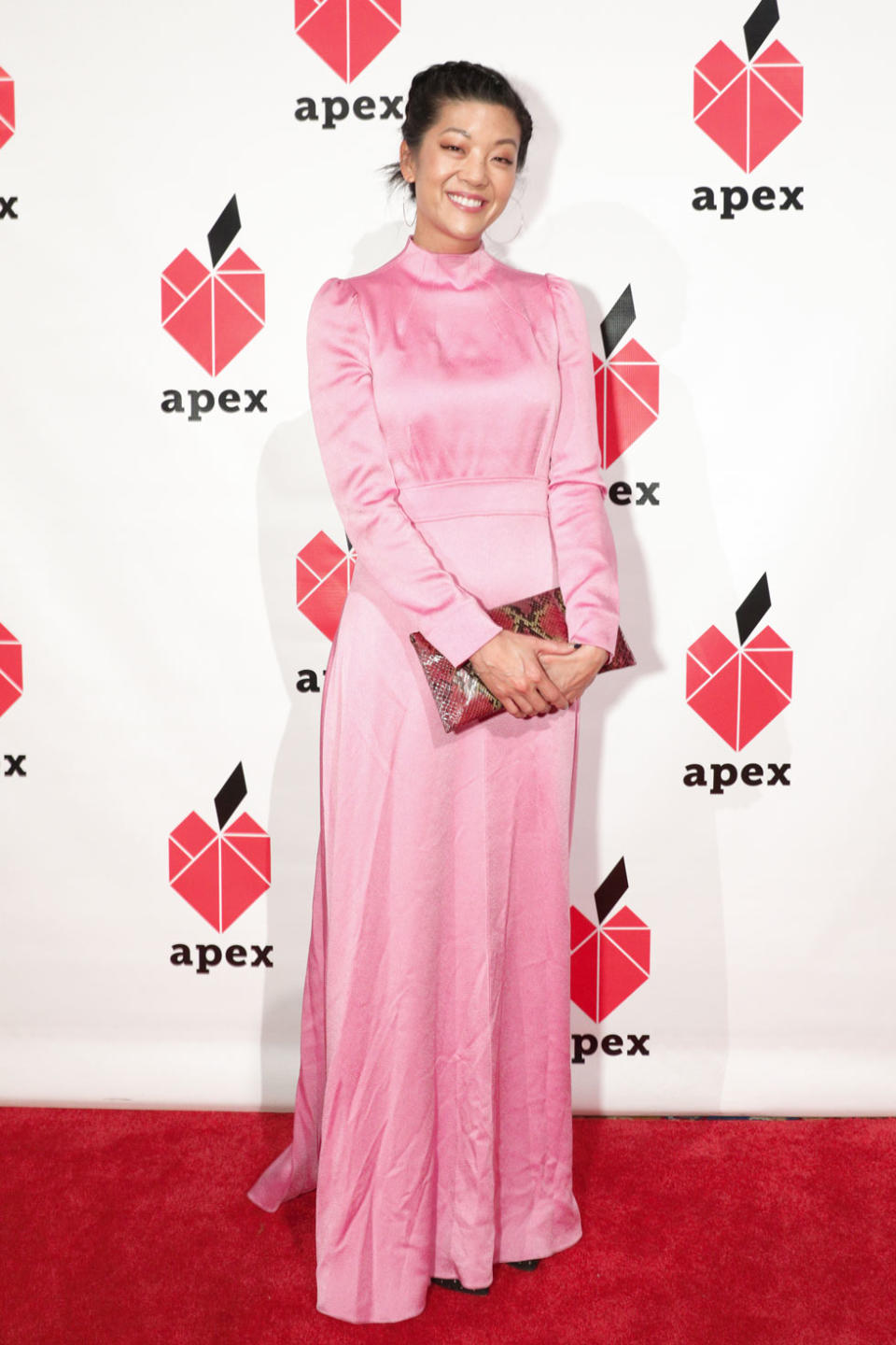 <p>Michelle Lee, editor in chief of <em>Allure</em>, wore a bright milllennial-pink dress at the gala. (Photo: BFA/Courtesy of Apex for Youth) </p>