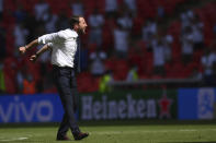 England's manager Gareth Southgate celebrates his side's 1-0 win at the end of the Euro 2020 soccer championship group D match between England and Croatia, at Wembley stadium, London, Sunday, June 13, 2021. (Laurence Griffiths, Pool via AP)