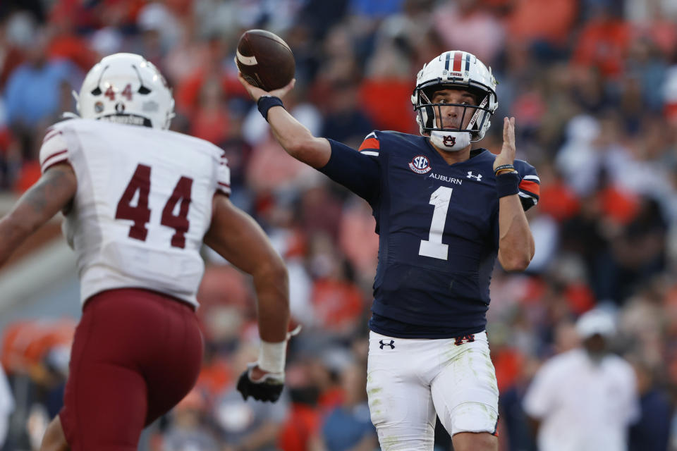 Auburn quarterback Payton Thorne (1) throws a pass during the first half of an NCAA college football game against New Mexico State Saturday, Nov. 18, 2023, in Auburn, Ala. (AP Photo/Butch Dill)