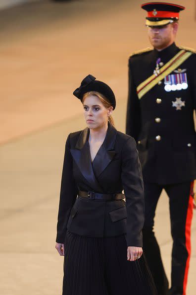 LONDON, ENGLAND - SEPTEMBER 17: Princess Beatrice of York and Prince Harry, Duke of Sussex are seen during a vigil in honour of Queen Elizabeth II at Westminster Hall on September 17, 2022 in London, England. Queen Elizabeth II's grandchildren mount a family vigil over her coffin lying in state in Westminster Hall. Queen Elizabeth II died at Balmoral Castle in Scotland on September 8, 2022, and is succeeded by her eldest son, King Charles III. (Photo by Chris Jackson/Getty Images)