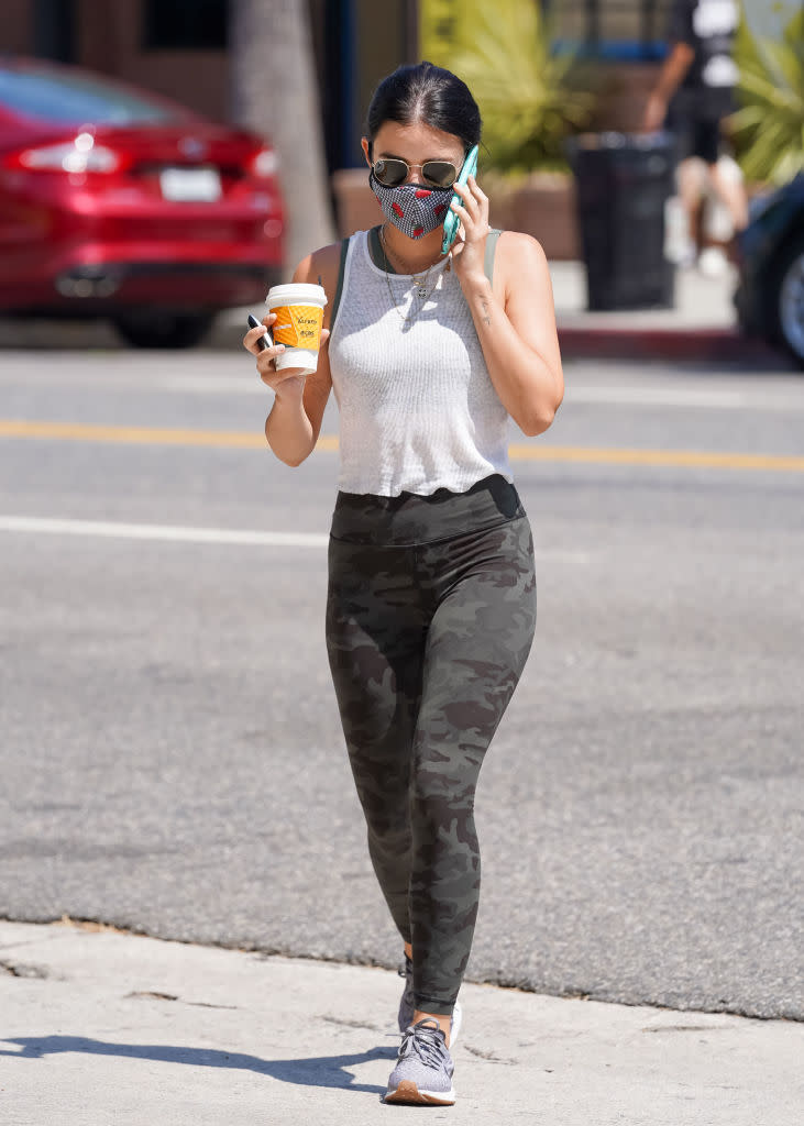 Lucy Hale wearing the Align Pant in Camo Multi Grey. (Photo by fupp/Bauer-Griffin/GC Images)