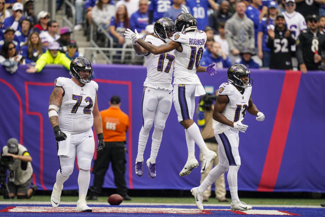 Baltimore Ravens running back J.K. Dobbins (27) runs with the ball against  the New York Giants during an NFL football game Sunday, Oct. 16, 2022, in  East Rutherford, N.J. (AP Photo/Adam Hunger