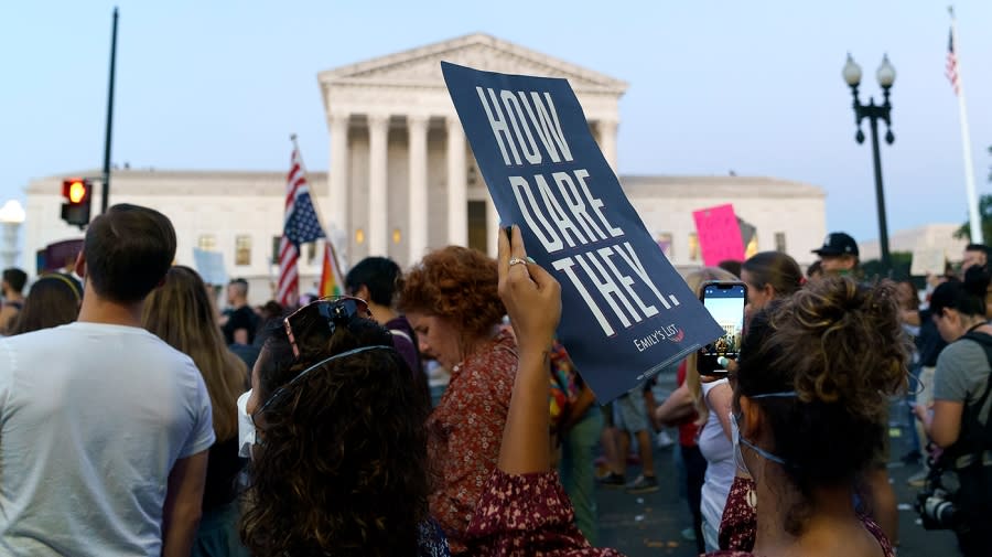 Protesters for abortion rights demonstrate outside the Supreme Court on Friday, June 24, 2022 after the court released a decision to strike Roe v. Wade.