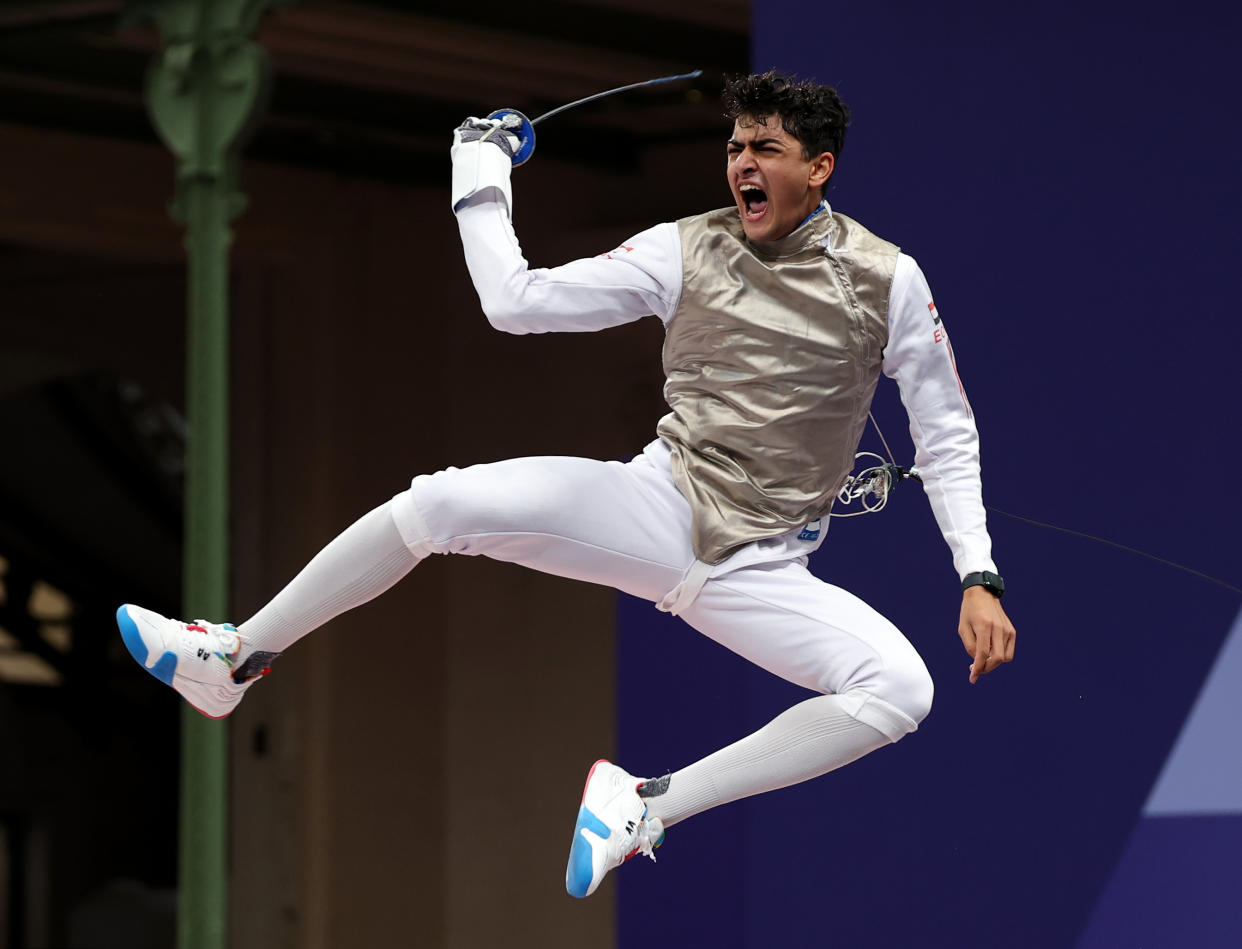 PARIS, FRANCE - JULY 29: Abdelrahman Hussein Tolba of Team Egypt celebrates his victory against Daniel Dosa of Team Hungary (not pictured) in the Fencing Men's Foil Individual Table of 32 on day three of the Olympic Games Paris 2024 at Grand Palais on July 29, 2024 in Paris, France. (Photo by Al Bello/Getty Images)