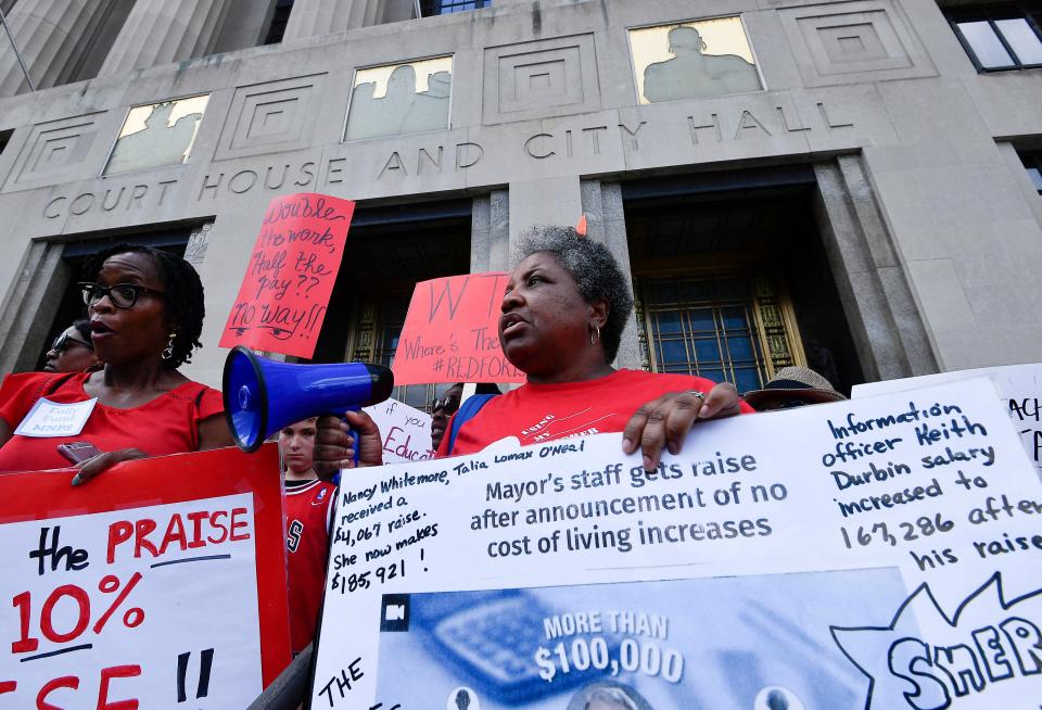 Sherrie Martin marches with fellow Nashville teachers in 2019 to demand higher wages. Martin has also been outspoken about the names of some Nashville schools, including J.T. Moore Middle School.