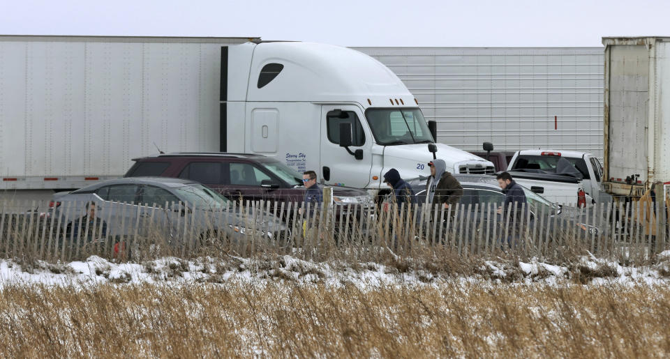 Emergency crews respond to a multi-vehicle accident in both the north and south lanes of Interstate 39/90 on Friday, Jan. 27, 2023 in Turtle, Wis. Authorities say snowy conditions led to a massive traffic pile-up in southern Wisconsin on Friday that left Interstate 39/90 blocked for hours. (Anthony Wahl/The Janesville Gazette via AP)