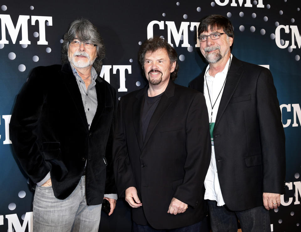 FILE - Randy Owen, from left, Jeff Cook and Teddy Gentry, of Alabama, pose on the red carpet at the CMT "Artists of the Year" on Dec. 3, 2013 in Nashville, Tenn. Cook died Nov. 7, 2022 at his home in Destin, Fla. He was 73. (Photo by Donn Jones/Invision/AP, File)