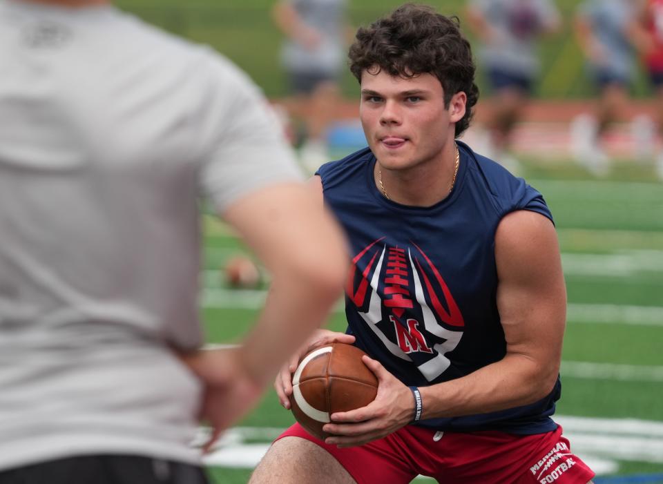 Mendham, NJ July 13, 2023 --  Zio Sullivan of Mendham practices for the upcoming season during his team’s summer football practice at Mendham HS.