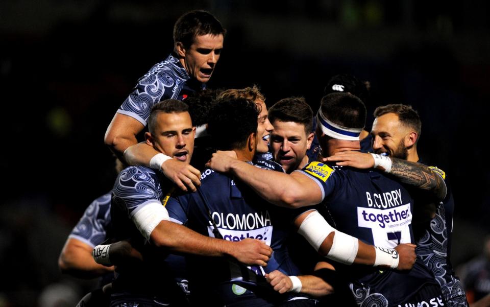 Denny Solomona of Sale Sharks celebrates with his team mates after scoring the first try during the Aviva Premiership match between Sale Sharks and Gloucester Rugby at AJ Bell Stadium on September 29, 2017 in Salford, England - Nathan Stirk/Getty Images