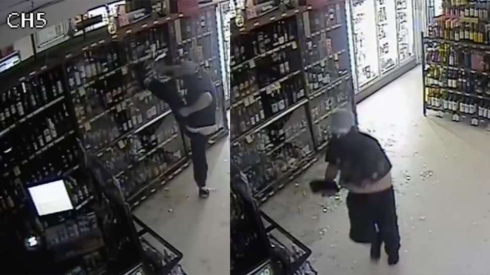 The thirsty thief can be seen smashing the liquor cabinet before stealing up to 10 bottles of alcohol. Photo: Victorian Police