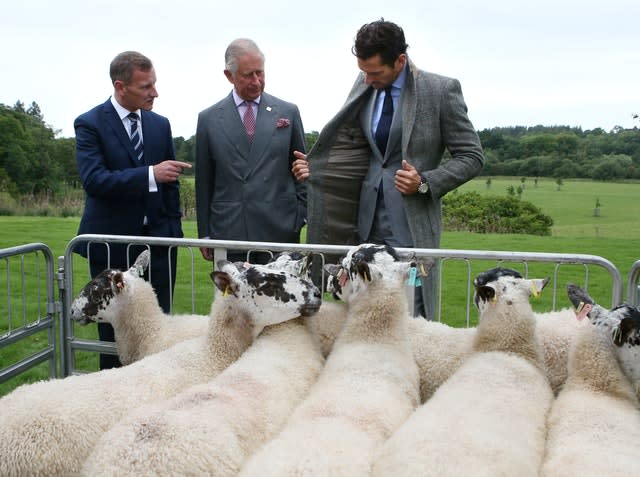 Charles, pictured with model David Gandy (right) and Marks and Spencer chief executive officer Steve Rowe