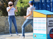 <p>Cobie Smulders and husband Taran Killam cast their ballots on Wednesday in L.A., and take photos to commemorate the moment.</p>