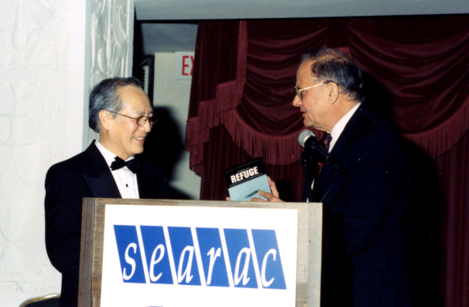Image: Le Xuan Khoa receives an award at the organization's 