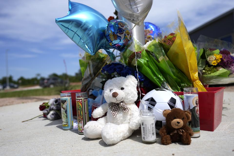 A make-shift memorial stands outside Northside Elementary School on Monday, May 1, 2023, in Cleveland, Texas. The youngest of five victims of a mass shooting on Friday, Daniel Enrique Laso, 9, was a student at the elementary school. The search for a Texas man who allegedly shot his neighbors after they asked him to stop firing off rounds in his yard stretched into a third day Monday. (AP Photo/David J. Phillip)