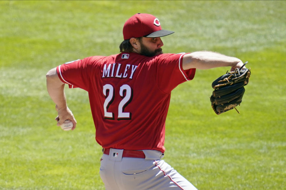 Cincinnati Reds pitcher Wade Miley (22) throws against the Minnesota Twins in the first inning of a baseball game, Tuesday, June 22, 2021, in Minneapolis. (AP Photo/Jim Mone)