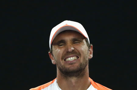 Tennis - Australian Open - Melbourne Park, Melbourne, Australia - 24/1/17 Germany's Mischa Zverev reacts during his Men's singles quarter-final match against Switzerland's Roger Federer. REUTERS/Thomas Peter