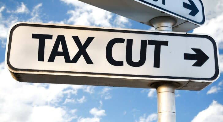 Street sign saying, TAX CUT