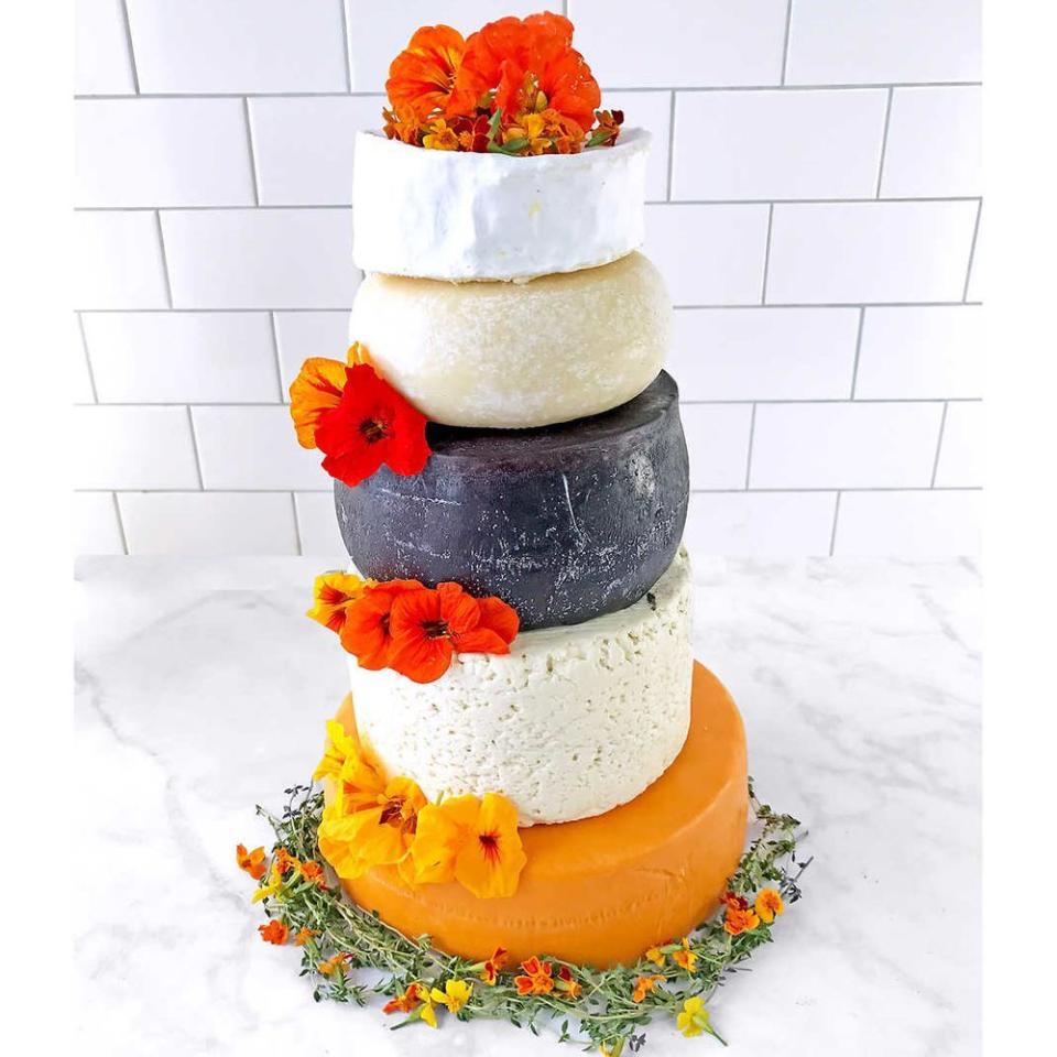 <p>costco.com</p><p><strong>$439.99</strong></p><p><a href="https://www.costco.com/Sid-Wainer-2526-Son-Cheese-Lover-Artisan-Wedding-Cake.product.100420818.html" rel="nofollow noopener" target="_blank" data-ylk="slk:Shop Now;elm:context_link;itc:0;sec:content-canvas" class="link ">Shop Now</a></p><p>Here comes the brie, here comes the brie ... find out just how delicious this <a href="https://www.bestproducts.com/lifestyle/a26098686/costco-sid-wainer-and-son-5-tier-wedding-cheese-cake/" rel="nofollow noopener" target="_blank" data-ylk="slk:5-Tier Cheese Wedding Cake;elm:context_link;itc:0;sec:content-canvas" class="link ">5-Tier Cheese Wedding Cake</a> really is here. </p>