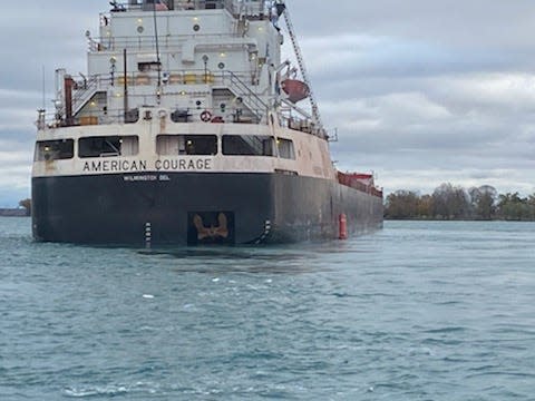 A 617-foot freighter ran aground in the St. Clair River Tuesday morning, the U.S. Coast Guard Detroit Sector announced. The cargo ship, named American Courage, was carrying 20,000 tons of stone when it ran aground.