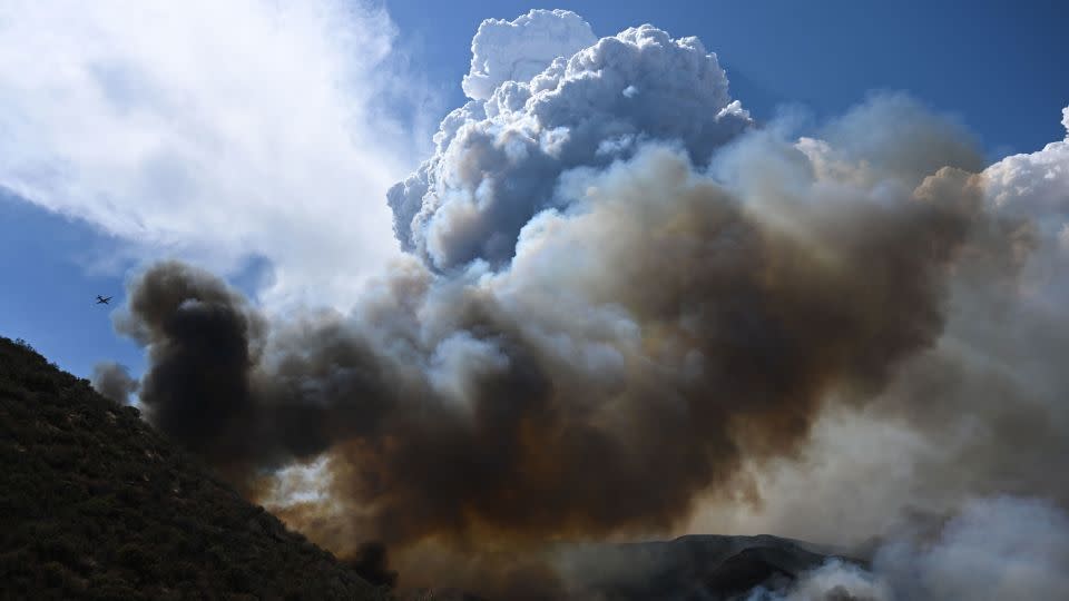 Smoke rises into smoke clouds as firefighters work to contain the Fairview Fire on September 7, 2022, in the San Bernardino National Forest in California. - Patrick T. Fallon/AFP/Getty Images