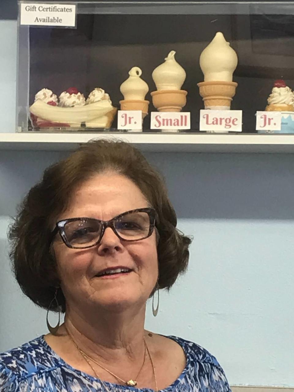 The photo behind Soula Rangousses, co-owner of the Morro Bay Fosters Freeze franchise, shows customers and employees how the restaurant’s trademark soft-serve ice cream cones and banana splits should look.