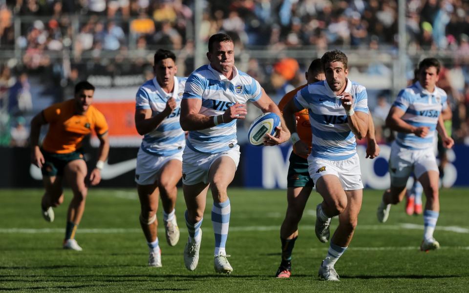 Emiliano Boffelli runs away from the Australia defence on a memorable night for Argentina  - GETTY IMAGES