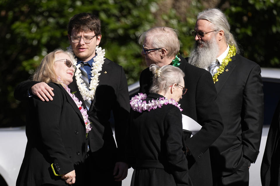 Amy Carter, left, and her husband John Joseph "Jay" Kelly, right, arrive for the funeral service for former first lady Rosalynn Carter at Maranatha Baptist Church, Wednesday, Nov. 29, 2023, in Plains, Ga. (AP Photo/John Bazemore)