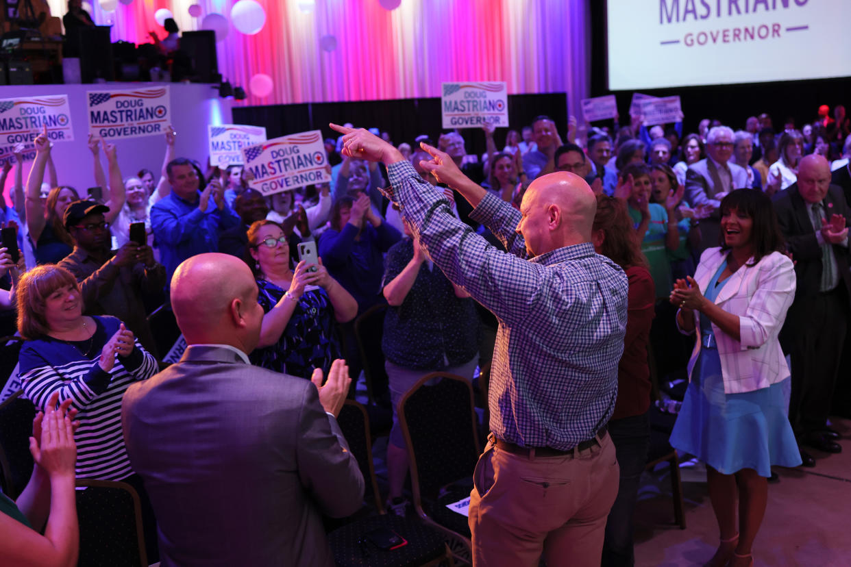 Republican gubernatorial candidate Doug Mastriano appears before a crowd at a campaign rally in Warminster, Pa