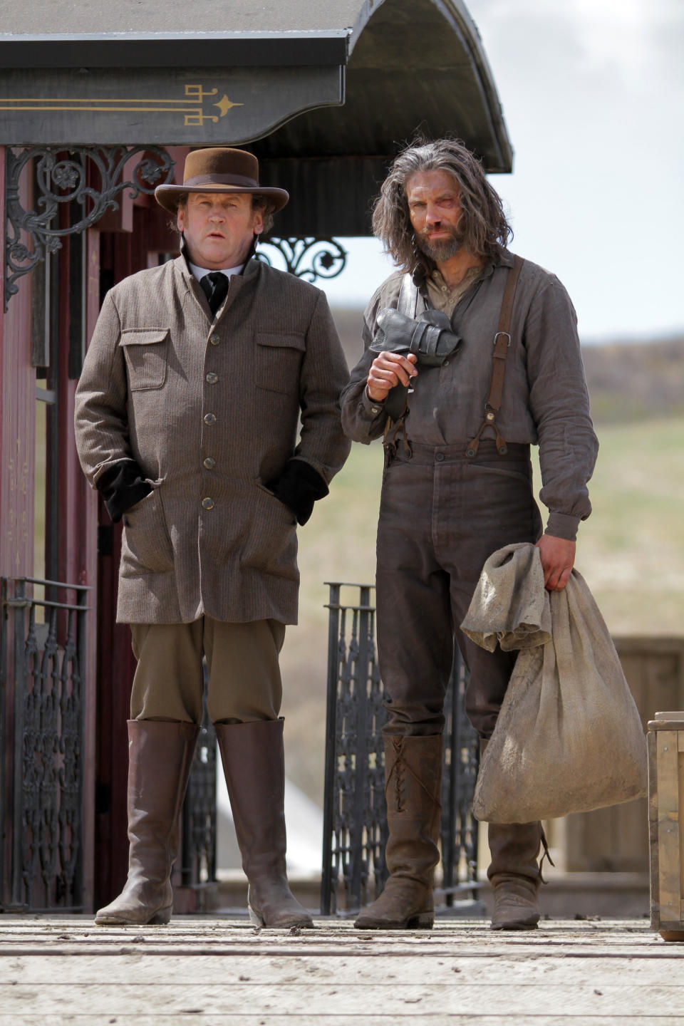 This image released by AMC shows Colm Meaney as Thomas “Doc” Durant, left, Anson Mount as Cullen Bohannon in a scene from "Hell On Wheels," airing Sundays at 9 p.m. EST on AMC. Returning for its second season, AMC's "Hell on Wheels" focuses on Cullen Bohannon, a former Confederate soldier who after the war heads west to Nebraska to work on the transcontinental railroad and, he hopes, avenge the death of his wife at the hands of someone likely to be found at the Union Pacific construction camp. (AP Photo/AMC, Michelle Faye)