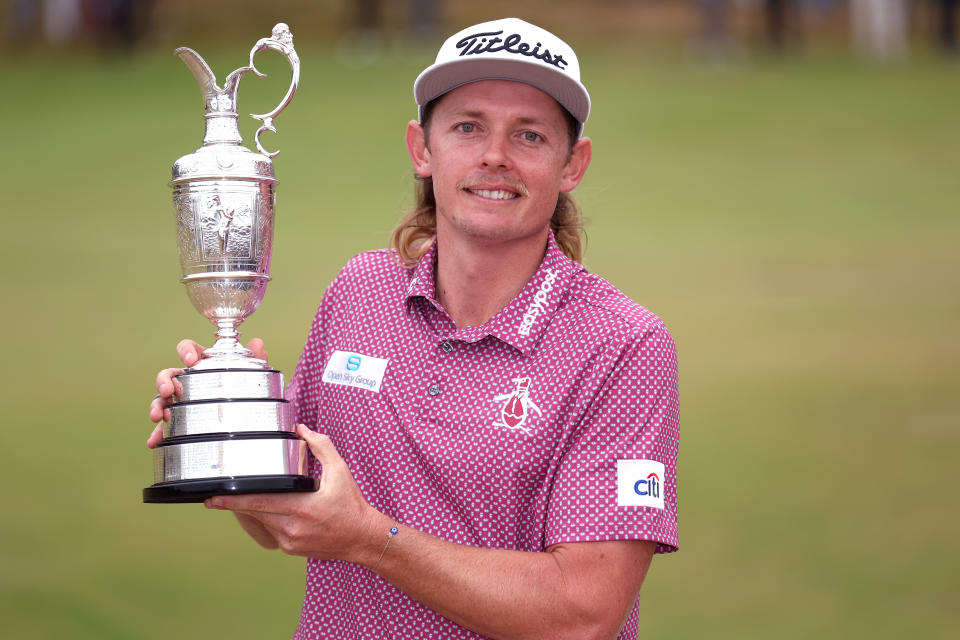 Pictured here, Cam Smith poses with the claret jug after winning The Open at St Andrews in 2022. 